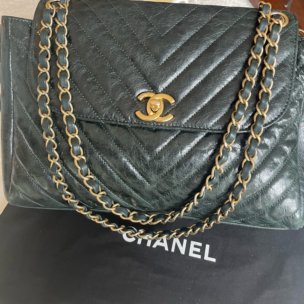 Chanel Flap bag in green chevron with gold hardware. Medium